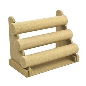 Three-tier linen jewelry display stand for bracelets, bangles, and watches on white background