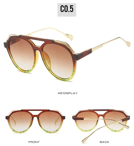 Detailed views of vintage aviator sunglasses with gold frames and gradient brown lenses