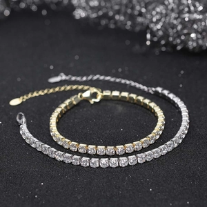 Macro detail of gold and silver S925 sterling silver tennis bracelets with cubic zirconia