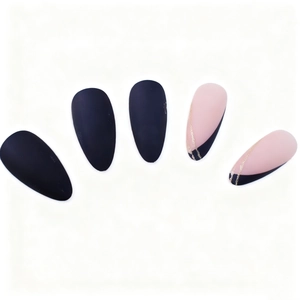 Matte black stiletto press-on nails with nude pink contrast and gold glitter lines