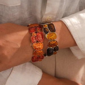 Retro geometric wide resin bracelets in orange and amber brown with golden metal edges