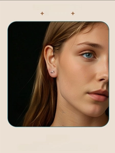 Detail showing infinity moissanite earrings in s925 sterling silver worn by a model