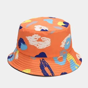 Close-up of vibrant graffiti bucket hat with reinforced stitching on the brim