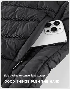 Close-up of black quilted vest featuring functional side pocket and nylon texture