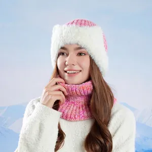 Winter knit hat and scarf set with faux fur earflaps in pink orange blend