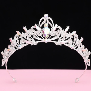 Detailed view of luxury baroque bridal crown with iridescent pear-cut diamond and crystals