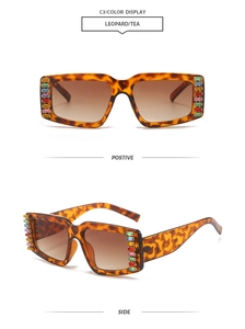 Detail of leopard print square sunglasses with sparkling rhinestone crystals and tea lenses