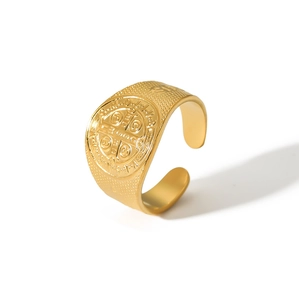 Macro detail of 18K gold plated St. Benedict medal ring with adjustable band and relief