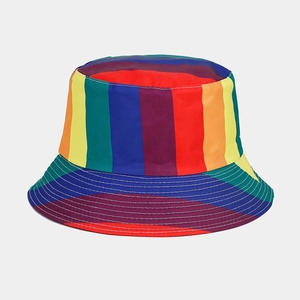 Close-up of vibrant rainbow vertical stripes on high-quality cotton bucket hat texture