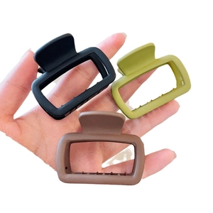 Three-piece set of matte square claw clips in black, olive green, and coffee colors