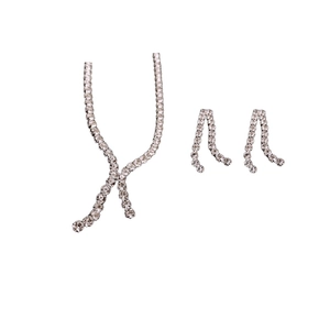 Elegant silver tassel jewelry set with zircon necklace and earrings on white background