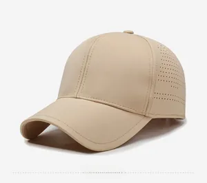 Detail view of khaki baseball cap featuring laser-cut ventilation holes for breathability