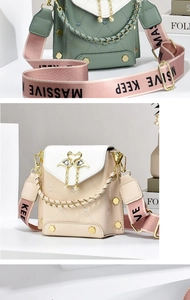 Detail view of stylish quilted shoulder bags with swan hardware and pearl charms