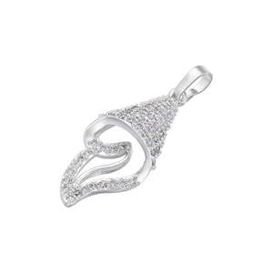 Macro detail of heart-shaped silver pendant inlaid with sparkling crystals on white background