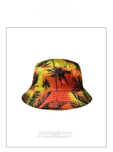 Detail of tropical palm tree print and gradient sunset colors on summer bucket hat