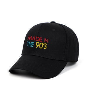 Classic black cotton baseball cap featuring colorful MADE IN THE 90'S embroidery