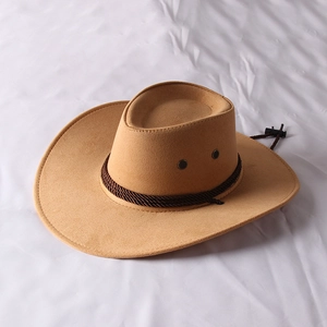 Detail of tan faux suede cowboy hat featuring brown braided band and adjustable chin cord