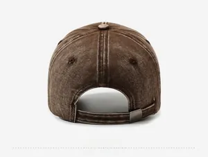 Back view of vintage washed brown cotton baseball cap with adjustable metal buckle detail