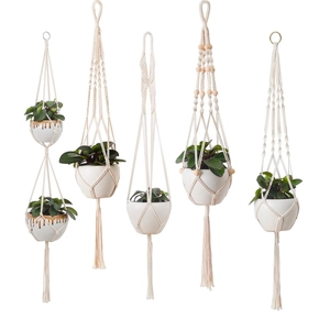 5-piece set of boho cotton rope plant hangers with wooden beads and tassels on white background