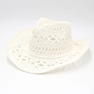 White hand-woven hollow knit cowboy hat with breathable crochet mesh and wide curved brim