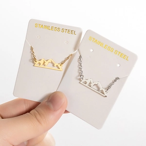 Gold and silver stainless steel hollow mountain peak pendant necklaces set