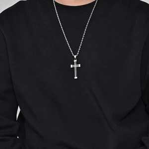 Men's silver titanium steel cross pendant necklace with layered twist chain on model