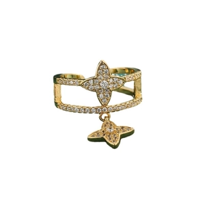 Adjustable gold double layer ring featuring sparkling zircon star pendant design