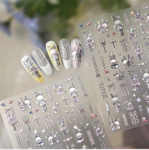 Detail of gothic Lolita nail art stickers with cute rabbit, bow, and cross patterns