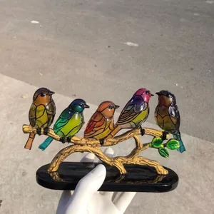 Five colorful birds on a golden branch statue with a black base home decor