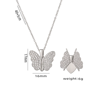 Turkish style silver butterfly locket necklace with sparkling pave crystal wings and heart
