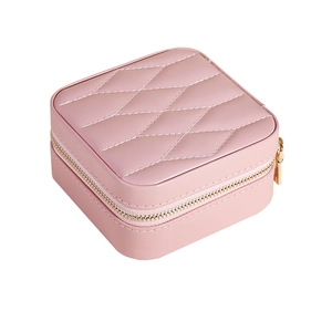 Portable pink PU leather jewelry box with quilted design and gold zipper closure