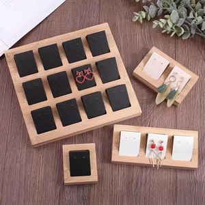 Bamboo wood earring display trays with black and white velvet cards for jewelry storage