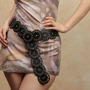 Vintage black punk waist belt with round studded discs for women fashion styling