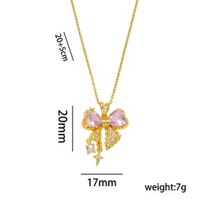 Sparkling pink bow pendant necklace in gold finish with measurements and specifications