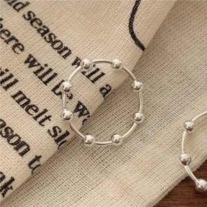 Minimalist 925 sterling silver beaded ring featuring six movable round metal beads