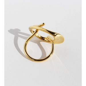 Creative twisted gold ring with artistic sculptural lines and a high-polish finish