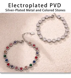 Close-up of stainless steel bracelets with PVD plating and colorful zircon stones
