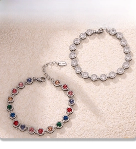 Close-up of stainless steel bracelets with PVD plating and colorful zircon stones
