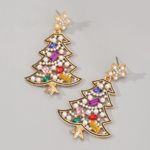 Close-up of golden Christmas tree earrings with colorful crystals and faux pearls