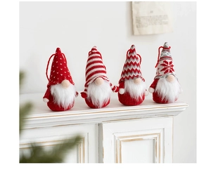 Detail of 4-piece Christmas gnome set with knitted hats and plush beards on wood