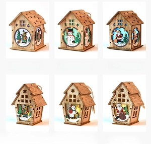Detailed views of LED wooden Christmas house ornaments with reindeer and snowman cutouts