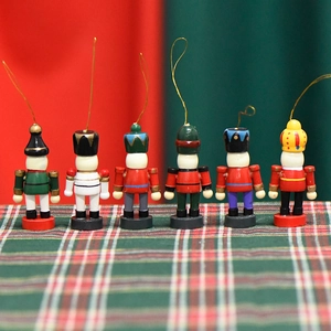 Set of 6 mini wooden nutcracker ornaments for Christmas tree with colorful soldier designs