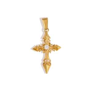 Macro shot of gold-plated gothic cross pendant with a central sparkling rhinestone detail