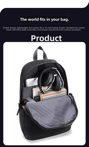 Detailed interior of black backpack showing organized compartments for a 14-inch laptop