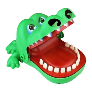 Green crocodile biting finger prank toy for kids, fun trick game made of durable plastic