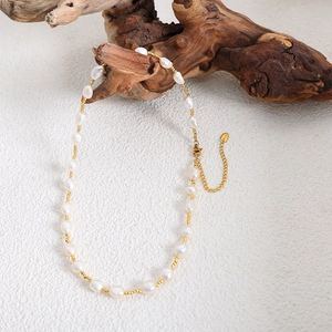 French style titanium steel necklace with long freshwater pearls and gold beads