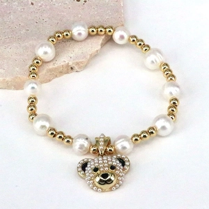 Chic pearl bracelet with gold beads and a micro-paved pearl teddy bear charm