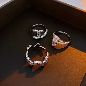 Luxury silver heart and crown zircon rings in a premium velvet gift box display