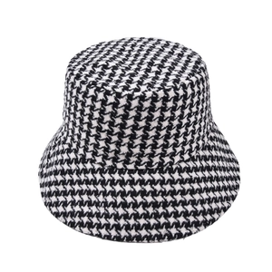 Classic black and white houndstooth bucket hat for women in a retro tweed design