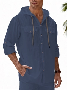 Detail of dark blue linen hooded shirt with chest pockets and texture for men